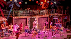 (center) Bryan Acker and members of the cast in JIMMY BUFFETT’S ESCAPE TO MARGARITAVILLE from Music Theater Works, now playing through November 1 in the North Theatre at the North Shore Center for the Performing Arts in Skokie.