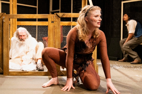 Gracie Wallace as Spider Woman, Richard Cotovsky as Old Man with Enormous Wings, and Heraldo Hermosillo as Son of the Husband and Wife in Andrei Kureichik's "The Man Who Fell with the Rain," in its U.S. premeire at Trap Door Theatre through September 26, 2026.